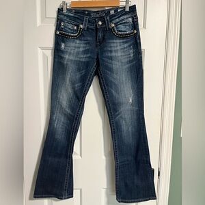 Miss Me, size 26, bootcut jeans with pocket details.